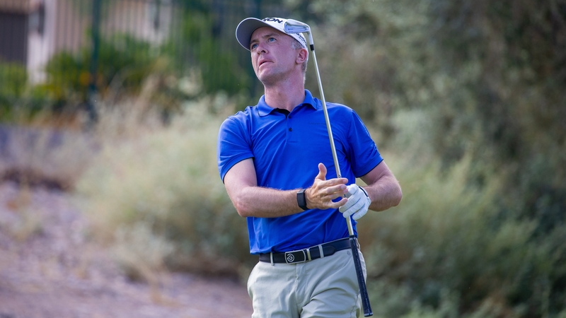 Martin Laird plays his tee shot on the eighth