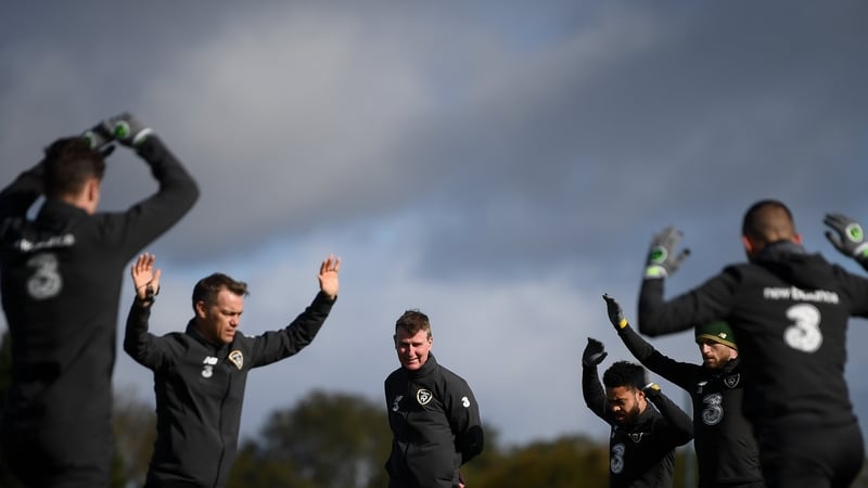 Ireland players go through their warm-up in Abbotstown