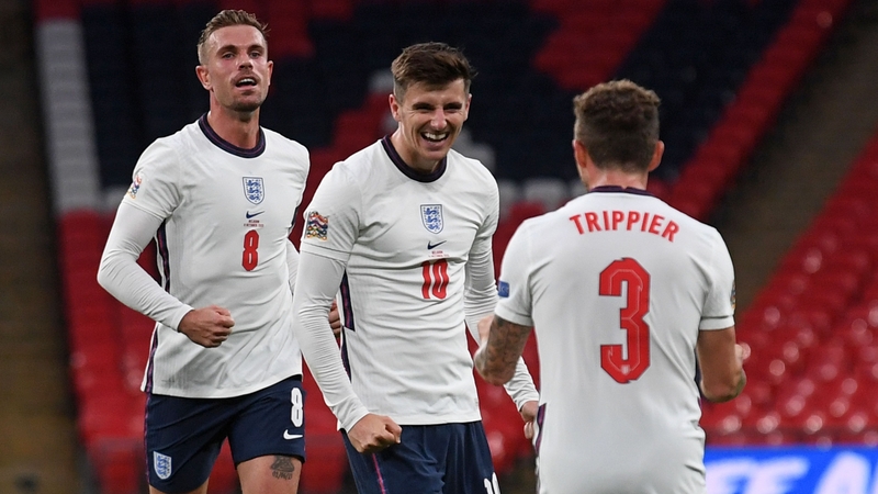 Jordan Henderson, left, and Kieran Trippier, right, congraulate England goal corer Mason Mount