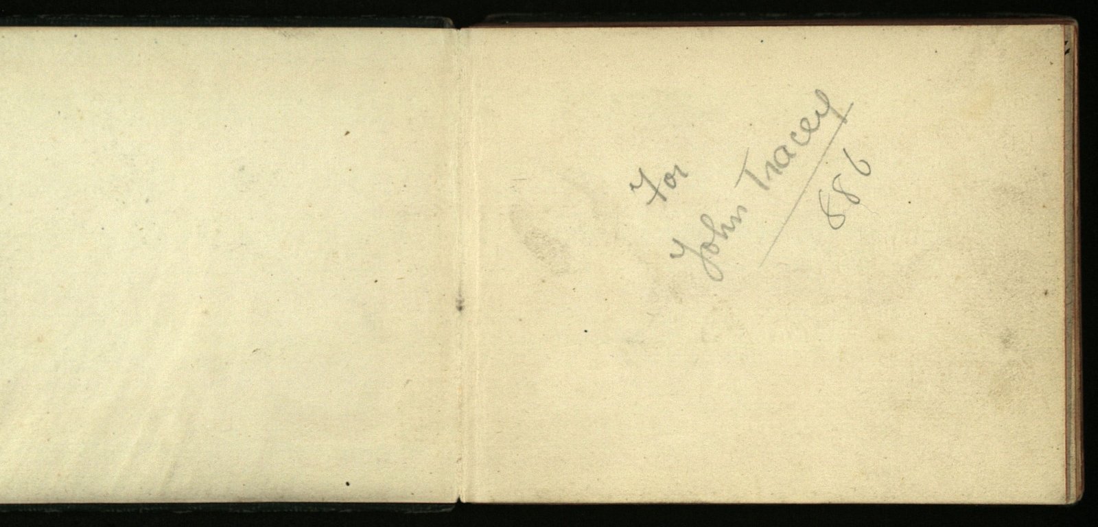 The cover and inside dedication page of the autograph book