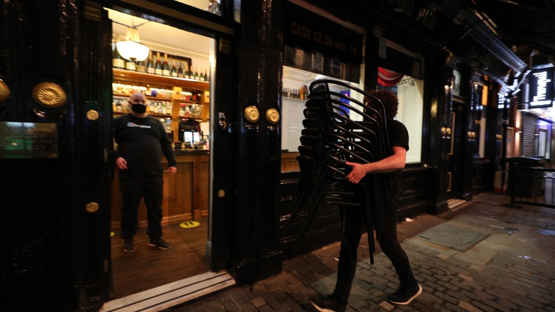 Staff at the Richmond Pub in Liverpool prepare for Tier 3 shutdown