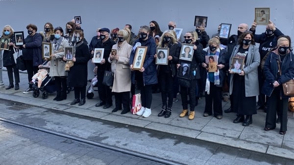 Families of the Stardust victims gather outside the Coroner's Court
