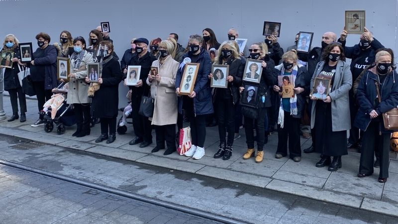 Families of the Stardust victims gather outside the Coroner's Court