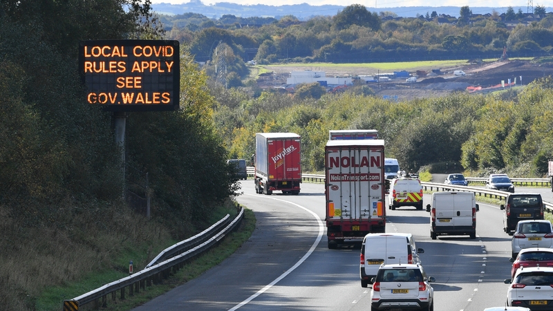 A sign on the M4 motorway near Cardiff in Wales reminds motorists of coronavirus rules