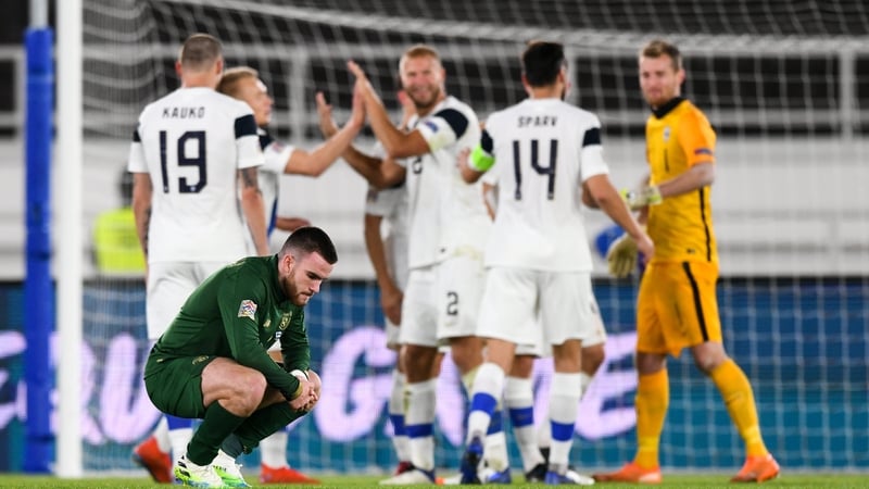 Aaron Connolly reacts as Finland players celebrate their victory
