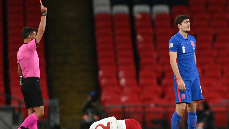 Harry Maguire is dismissed for a tackle on Denmark's striker Kasper Dolberg