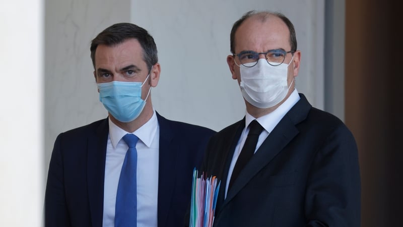 French Health Minister Olivier Véran with Prime Minister Jean Castex, who is also under investigation
