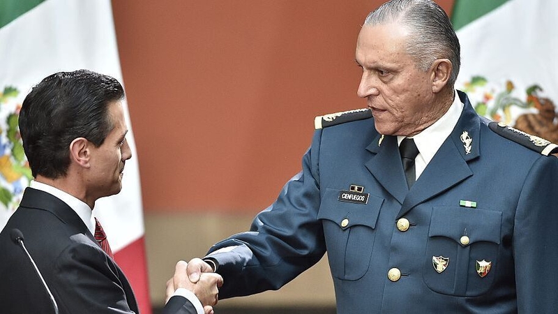 General Cienfuegos (R) pictured with former Mexican president Enrique Pena Nieto in 2016