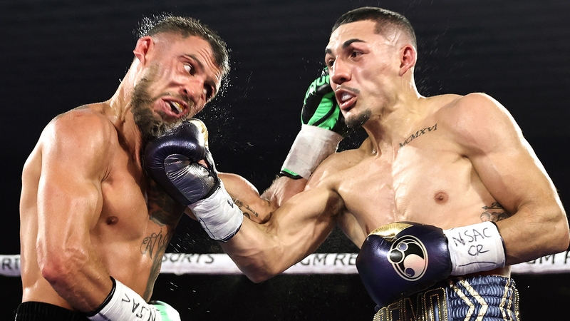 Teofimo Lopez (r) scored a unanimous points victory over Vasyl Lomachenko