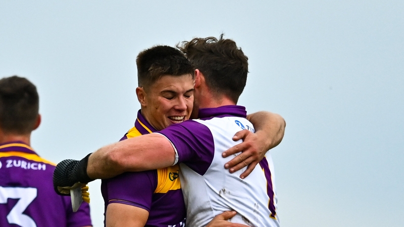 Eoin Porter celebrates with goalkeeper Pa Doyle, who made two crucial saves in the second-half