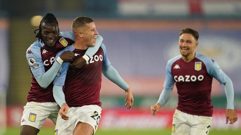 Ross Barkley celebrates with teammates Bertrand Traore and Matty Cash after his late winner