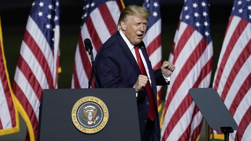 US president Donald Trump dances to "YMCA" at a campaign rally in Virginia. Photo: Drew Angerer/Getty Images