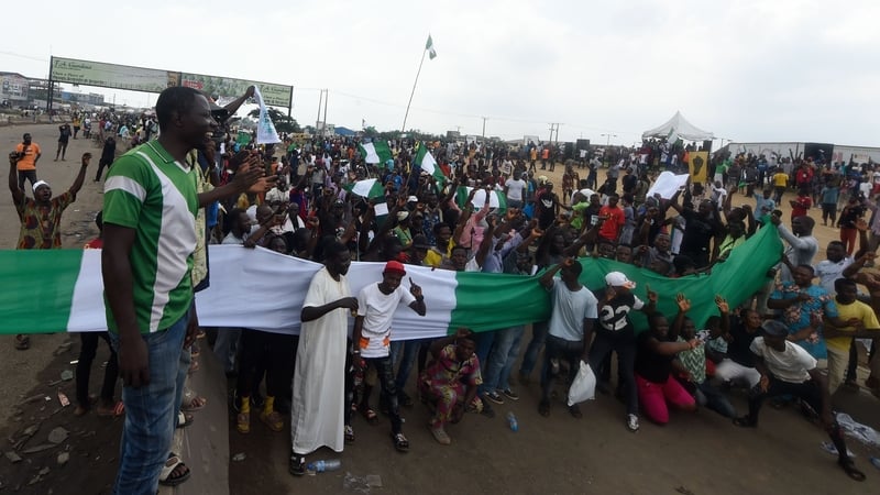 Protesters barricade the Lagos-Ibadan expressway during a demonstration to protest against police brutality at Magboro, Ogun State, Nigeria, today
