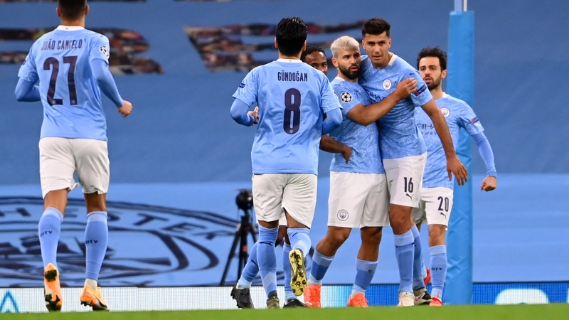 Sergio Aguero celebrates with his City team-mates following his goal