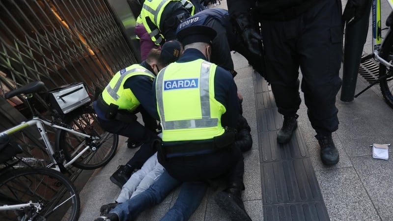 Gardaí and protesters in Grafton Street, Dublin today (pic: Rollingnews.ie)