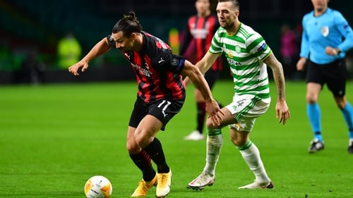AC Milan's Zlatan Ibrahimovic looks to break past Celtic's Shane Duffy