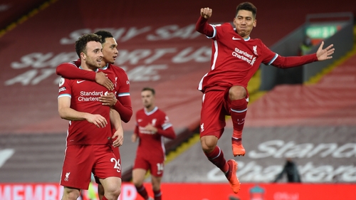Liverpool players celebrate at Anfield