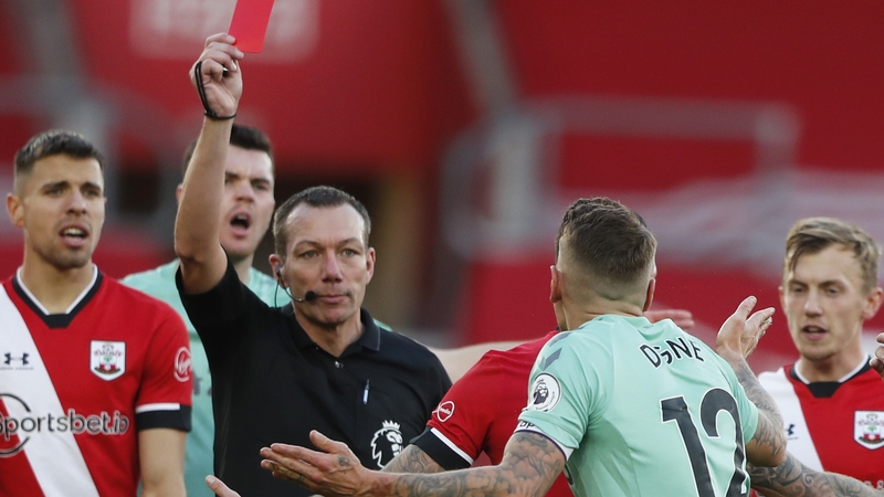 Lucas Digne is dismissed by referee Kevin Friend