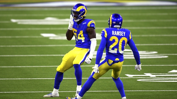 Rams Linebacker Leonard Floyd (54) looks at the Chicago Bears bench as he celebrates with cornerback Jalen Ramsey (20) after stopping the Bears during the first half at SoFi Stadium