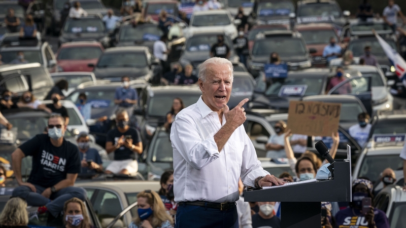 Joe Biden speaks to supporters at a drive-in rally in Atlanta, Georgia