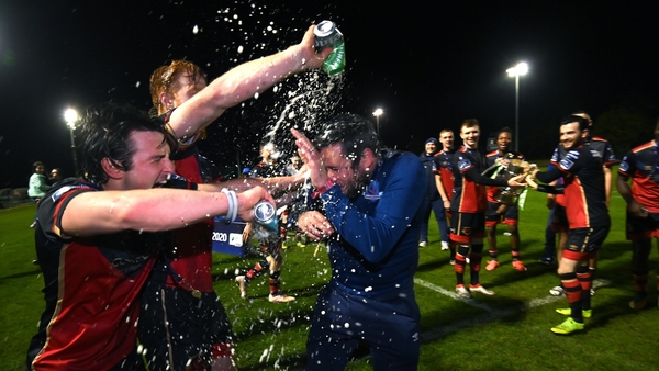 Drogheda players made sure their manager was right in the thick of the celebrations