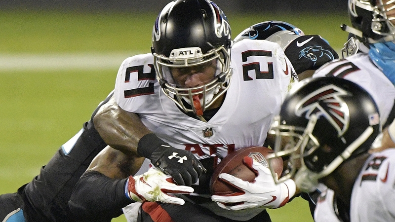 Todd Gurley (21) of the Atlanta Falcons on the charge against the Carolina Panthers