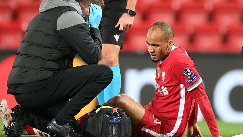 Fabinho (R) was forced off midweek