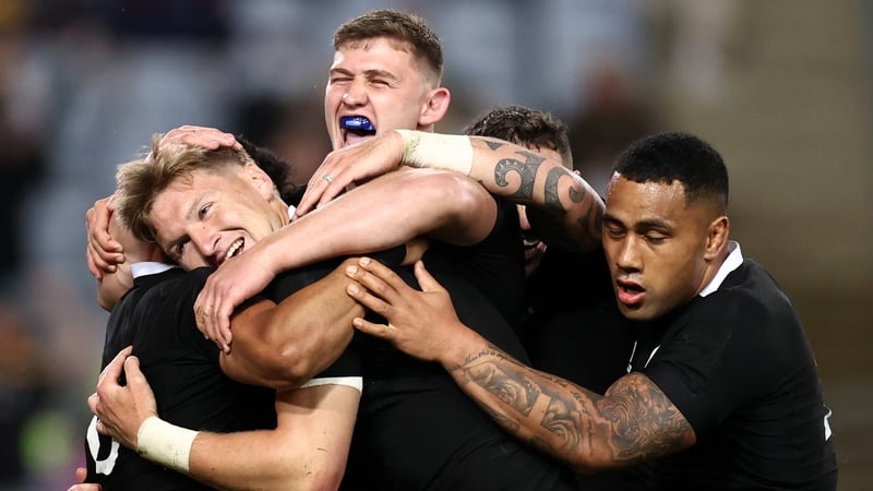 Jordie Barrett celebrates his try with Dalton Papalii and Ngani Laumape