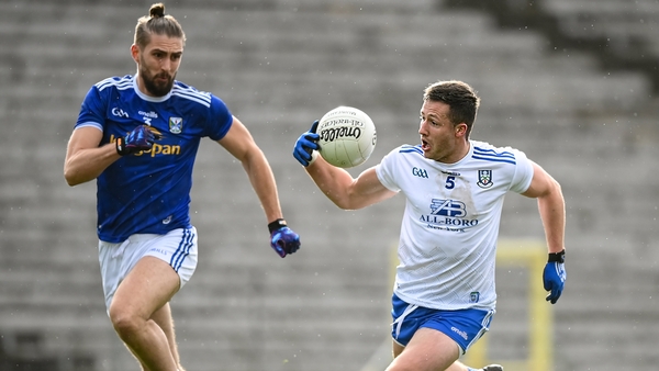 Dessie Ward of Monaghan evades Cavan's Killian Clarke