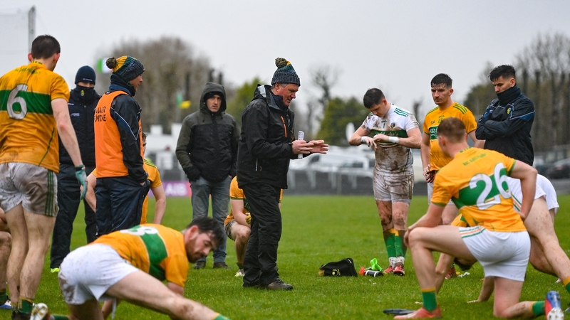 Hyland with his players after the 2020 championship game against Mayo