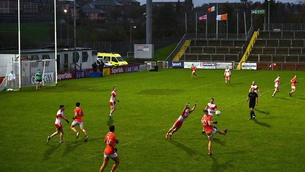 Jarly Óg Burns lobs over a point for Armagh