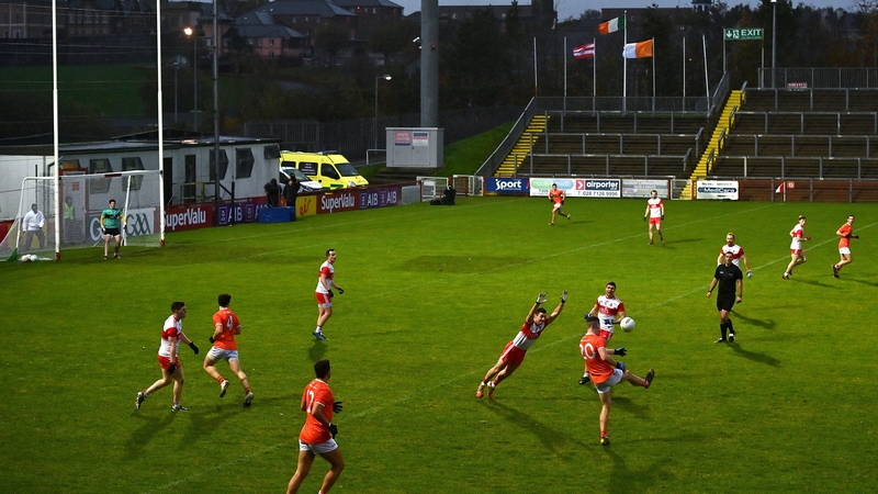 Jarly Óg Burns lobs over a point for Armagh