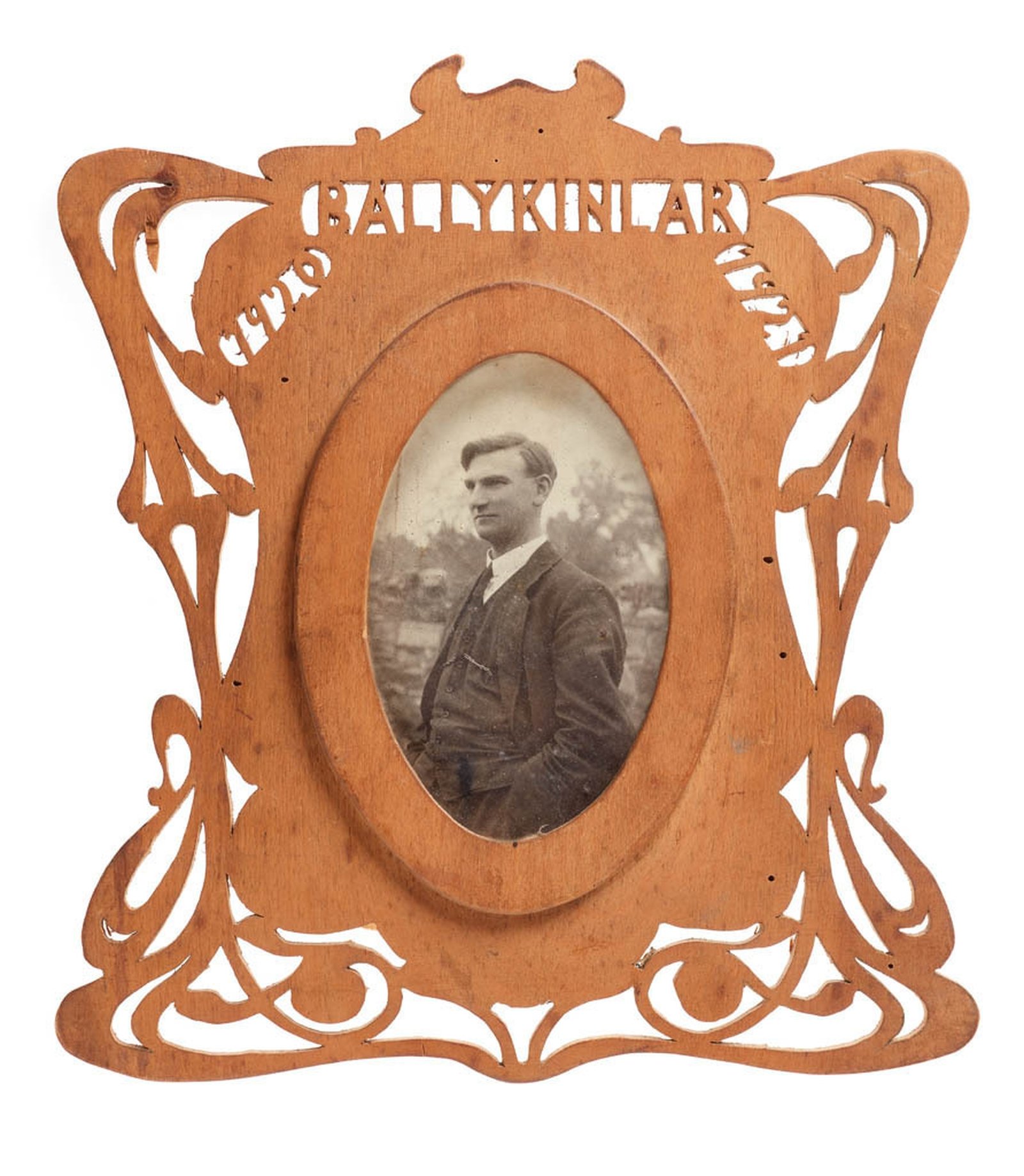 Photograph of Mr. Joseph McGrath in carved frame. Image courtesy of the  National Museum of Ireland HE:EW.598