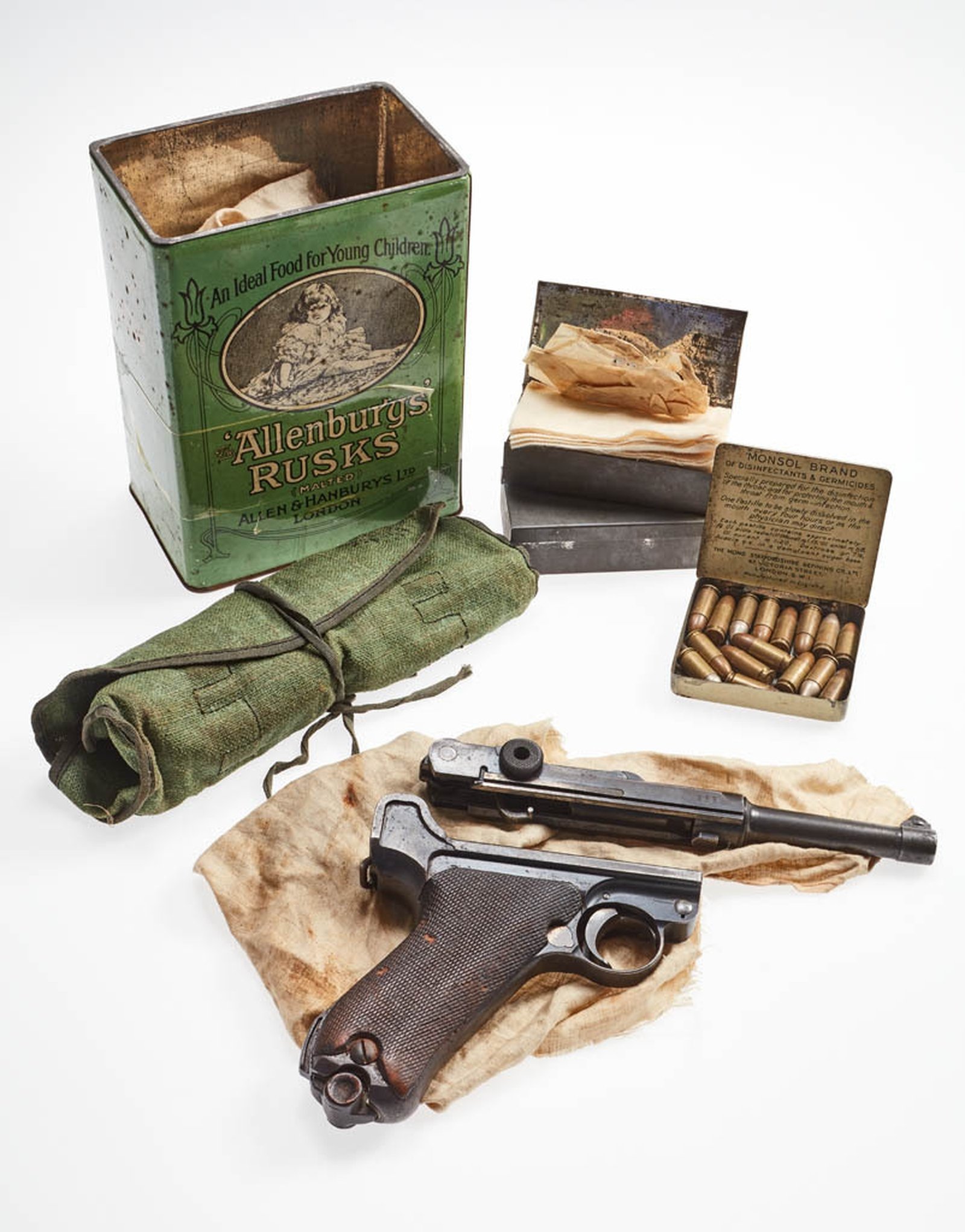 Luger pistol, ammunition and cleaning kit found stashed in a Allensbury's Rusk tin, c. 1922. Image courtesy of the National Museum of Ireland HA:2012.25