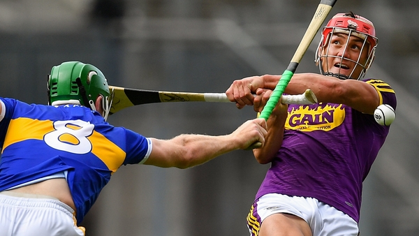 Noel McGrath blocks Lee Chin's shot during last year's All-Ireland semi-final