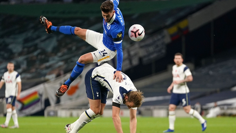 Adam Lallana conceded a penalty for this collision with Harry Kane