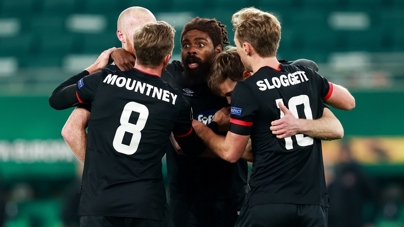Dundalk players celebrate David McMillan's penalty kick that brough the Lilywhites level with Rapid Vienna in the 82nd minute