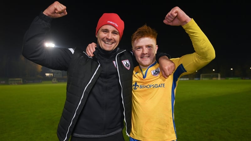 Longford boss Daire Doyle and goalscorer Aodh Dervin celebrate at Belfield