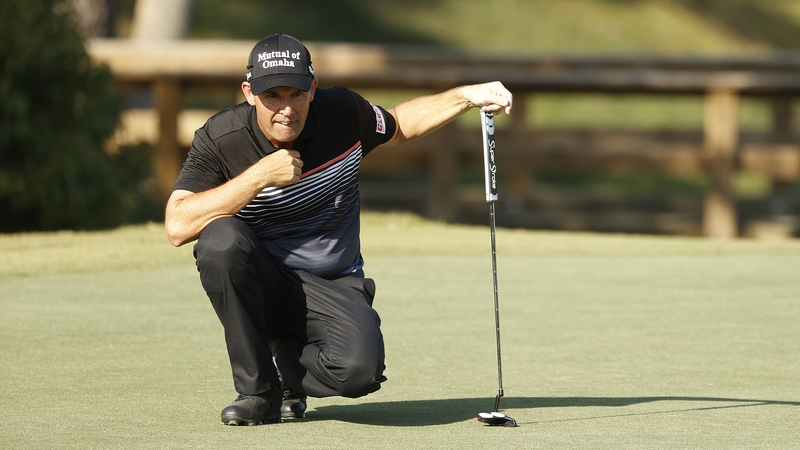 Padraig Harrington looks over a putt on the seventh green during the second round