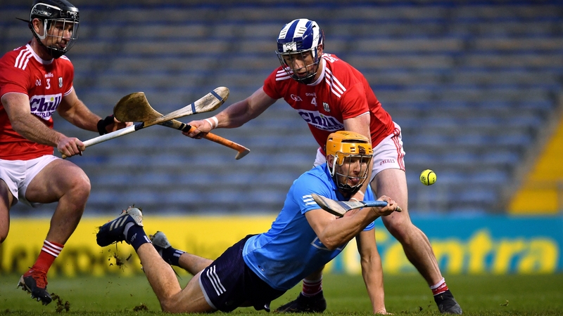 Éamon Dillon of Dublin comes under pressure from Seán O'Donoghue (r) and Colm Spillane