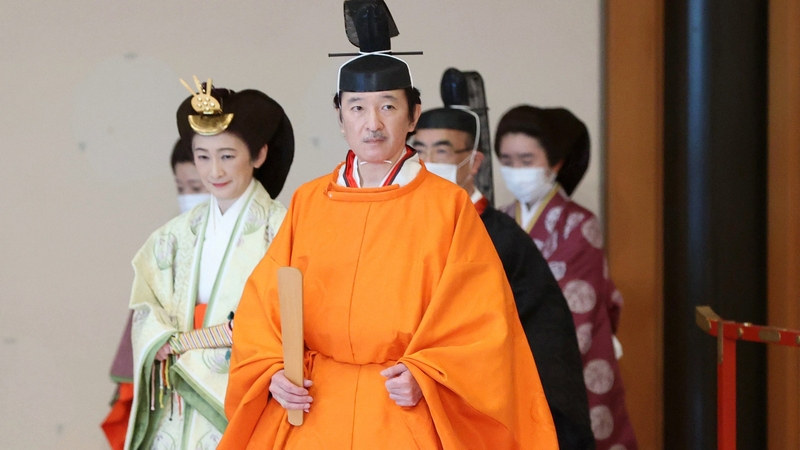 Crown Prince Akishino wore orange robes as he was declared next in line to the Japanese throne