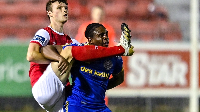 Luke McNally of St Patrick's Athletic (l) in action against Andre Wright of Bohemians