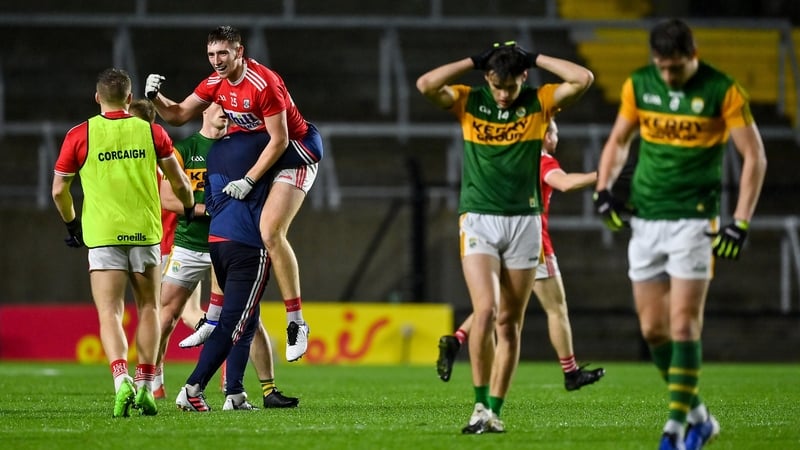 Mark Keane celebrates with Cork teammates after kicking the late winner against Kerry