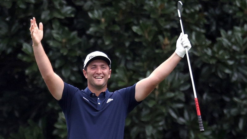 Jon Rahm celebrates his hole in one on the 16th