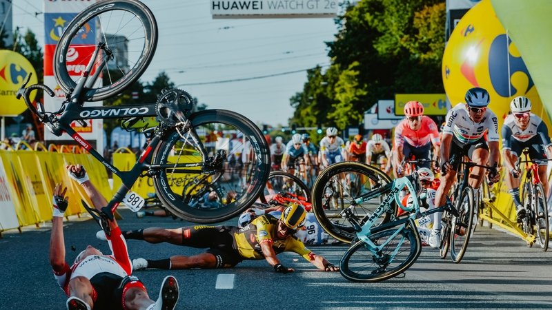 Dylan Groenewegen (C) caused the horror crash when he veered off his racing line