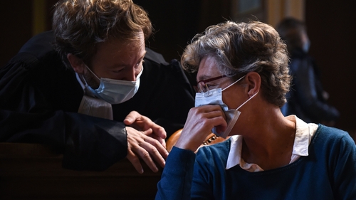 Helga Wauters seen with her lawyer in court in October