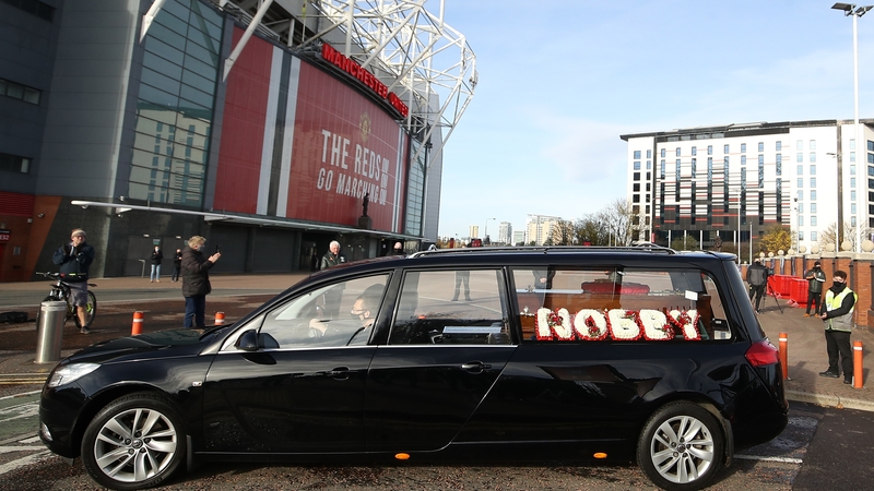 The hearse carrying Nobby Stiles passes by the ground where he made his name