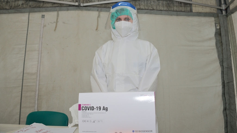 A nurse takes swabs for Covid-19 in Florence, Italy