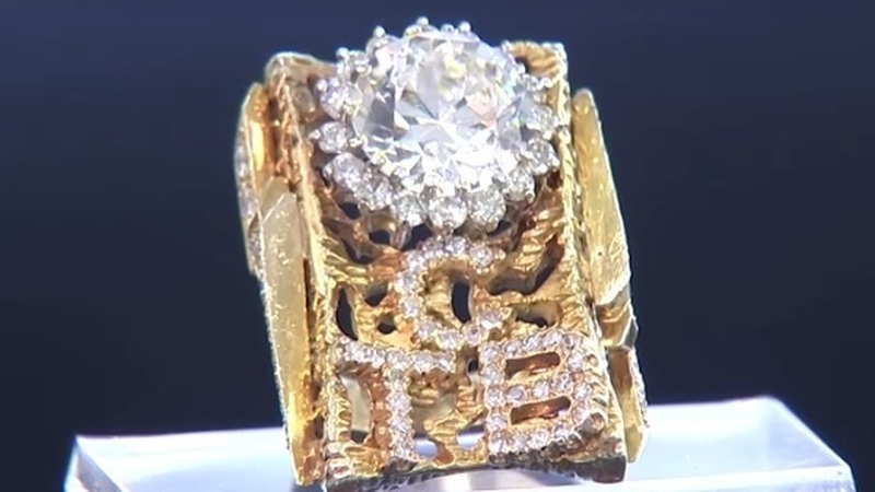 The TCB on the ring stands for 'Taking Care of Business'