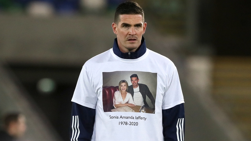 Northern Ireland's Kyle Lafferty wears a t-shirt in memory of his sister Sonia during the warm-up ahead of Thursday's Euro 2020 play-off against Slovakia